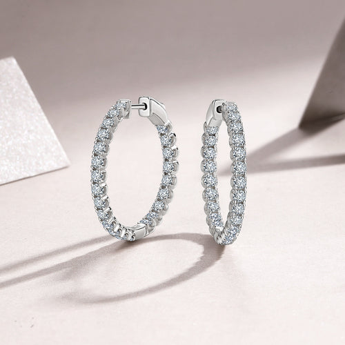 A Luxurious And Fashionable Ring Earring Set Featuring Top-quality Moissanite Stones, Made Of S925 Silver Electroplated With Platinum.
